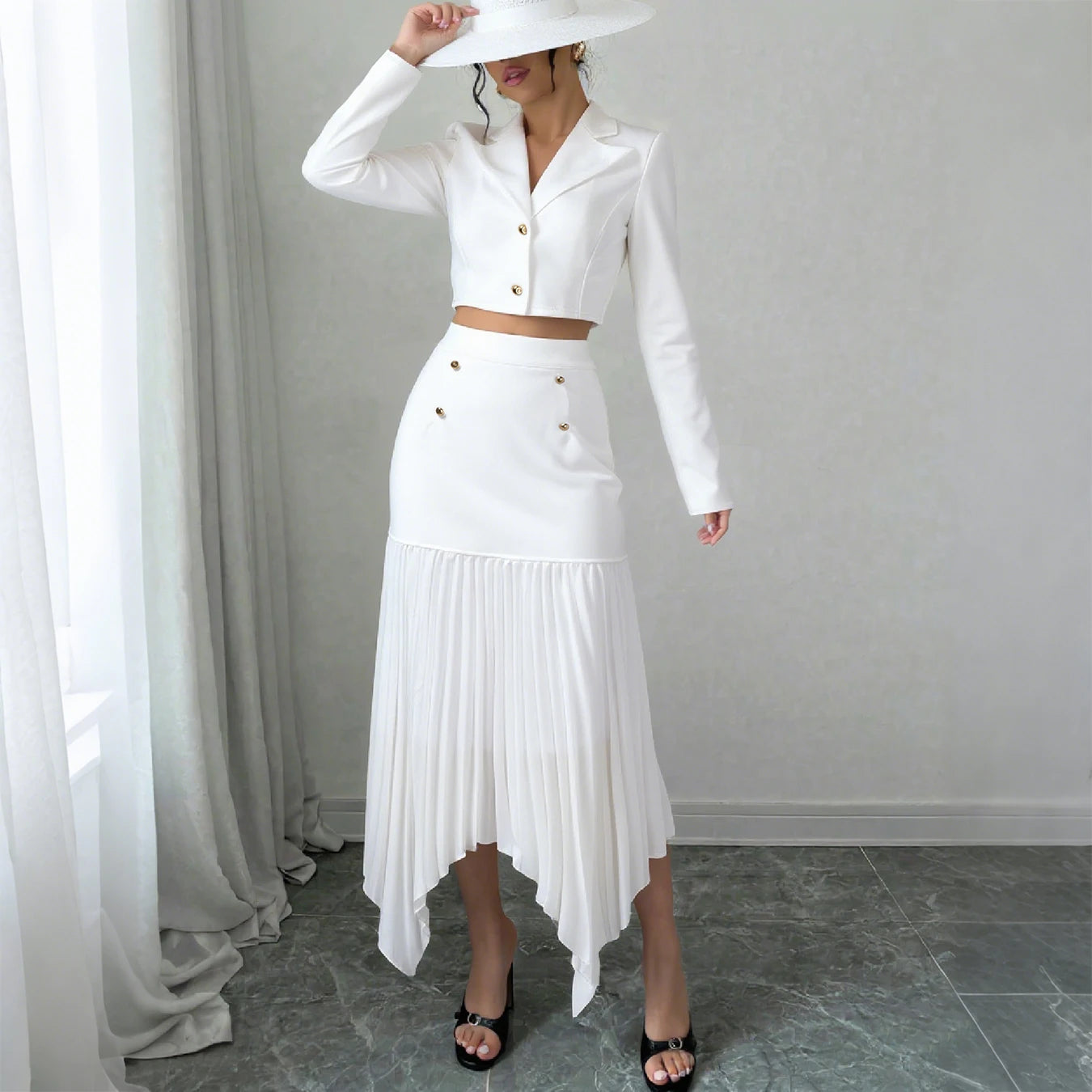 A two-piece set of elegant white short suit and irregular pleated skirt for women in autumn and winter, with golden buttons