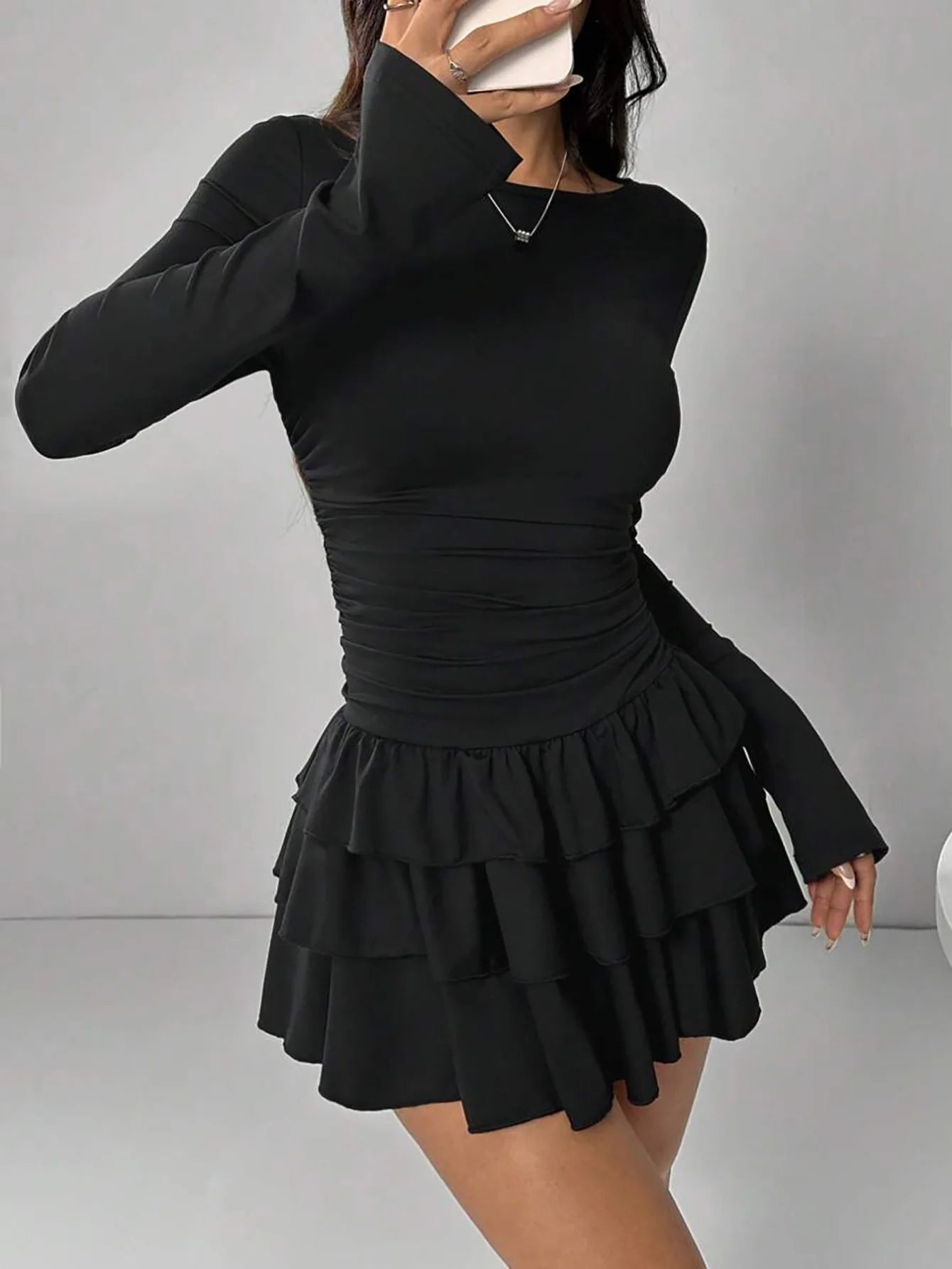 Solid Slim Fit Cascading Ruffles Mini Dress with Flare Sleeve High Waist and Bodyconture